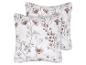 Twee witte kussenslopen met een delicaat bruin en beige bloemenpatroon