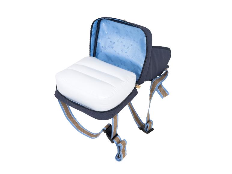 Open blauwe tas met een wit opblaasbaar kussen erin.