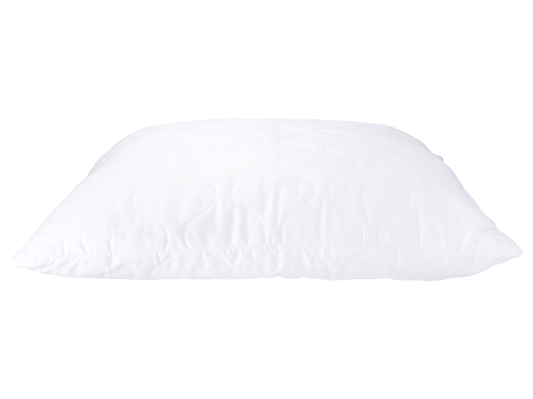 Wit gewatteerd kussen.