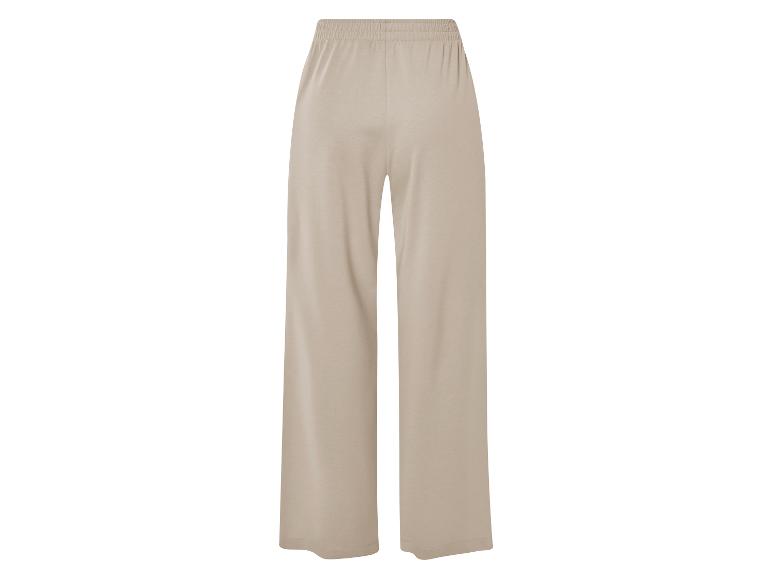 Beige broek met elastische tailleband.