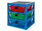 Blauwe opbergkast met drie laden voor LEGO-stenen.