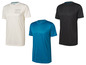 Drie Crivit T-shirts in wit, blauw en zwart voor sporten.