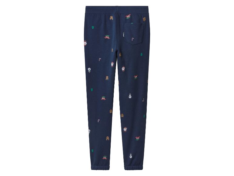 Donkerblauwe joggingbroek met kerstmotieven zoals de Kerstman, sneeuwpoppen en peperkoekmannetjes.