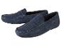Twee paar blauwe suède mocassins.