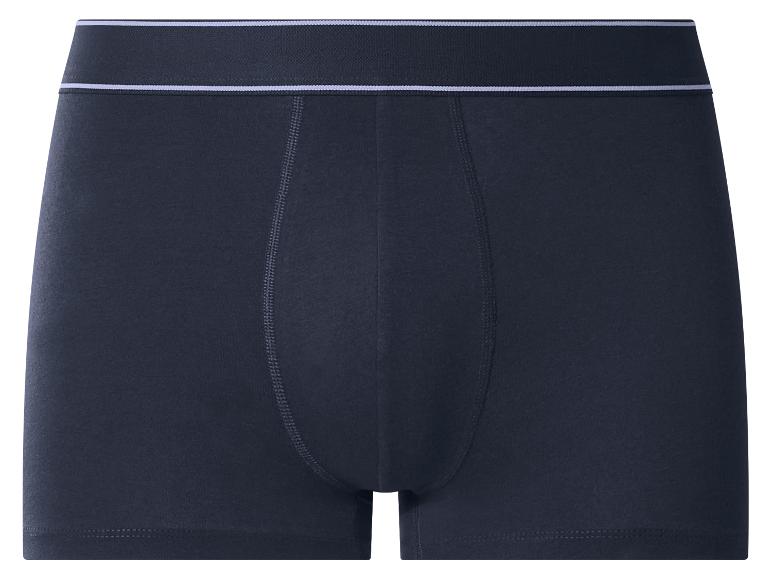 Donkerblauwe boxershorts met een witte tailleband.