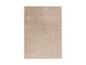 Rechthoekig beige vloerkleed met golvend reliëfpatroon.