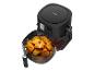 Cecotec airfryer met knapperige nuggets.