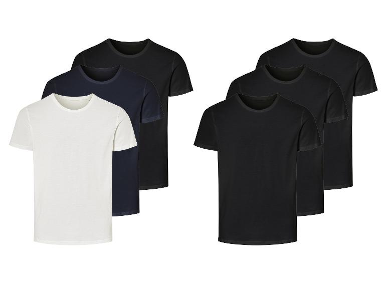 Set basic t-shirts: wit, zwart en donkerblauw.