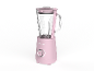 Roze blender met glazen kan en maatverdeling.