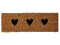 Bruine deurmat met drie zwarte harten.