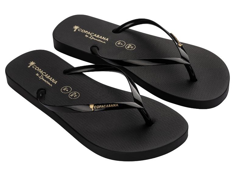 Zwarte teenslippers met gouden details en gestructureerde zool.