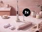 DENTALUX® accu-sonische tandenborstel met accessoires in de badkamer.
