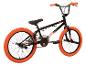 Zwarte RUDE BMX-fiets met oranje banden en accenten.