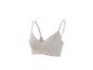 Lichtbeige geribbelde bralette met verstelbare bandjes.