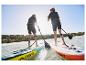 Twee personen suppen op opblaasbare Crivit paddleboards.
