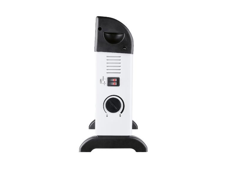 Wit en zwart elektrisch kachel met thermostaat en stroomschakelaars