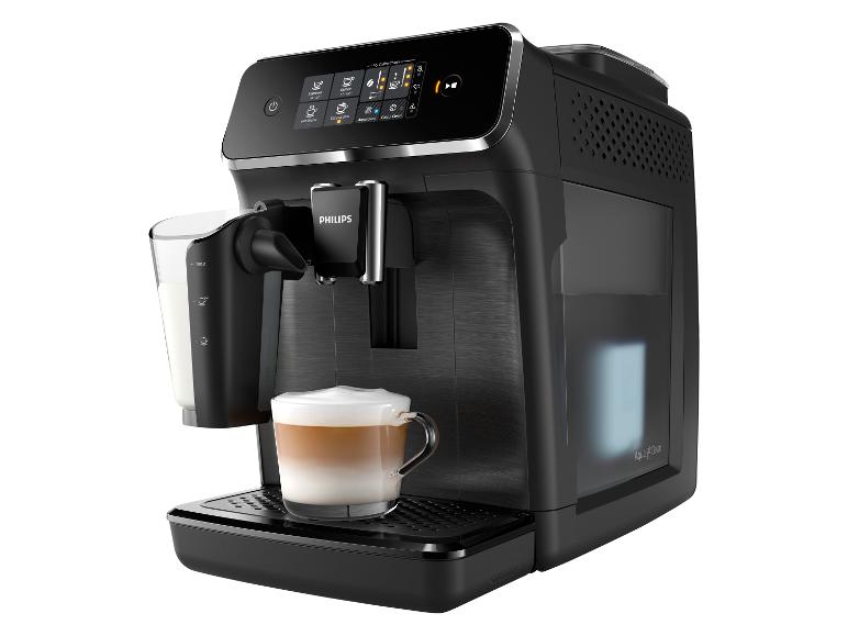 Een zwarte Philips koffiemachine met een kopje cappuccino.