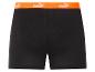 Zwarte Puma shorts met oranje band.
