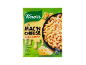 Groene verpakking van mac 'n cheese mix met gesmolten kaas en macaroni.