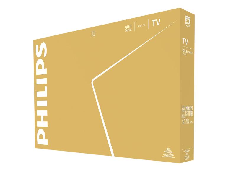 Bruine doos voor een QLED Smart TV met productdetails en bedieningsinstructies.