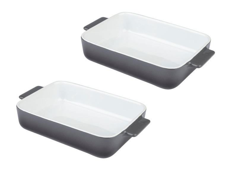 Twee grijze ovenschaaltjes met witte binnenkant.