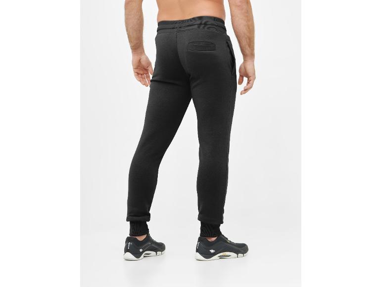 Zwarte joggingbroek voor heren met boorden en achterzak.