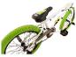 Witte BMX-fiets met groene banden en zwart zadel met logo.