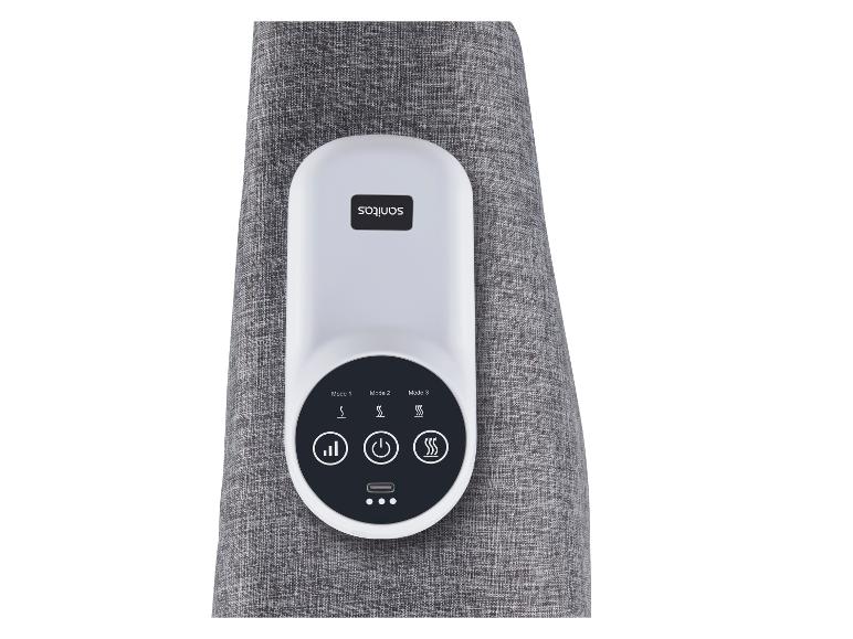 Massagecontroller met digitaal display en knoppen voor modi en warmte, op grijze stof.