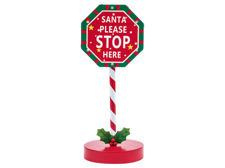 Kerststopbord met de tekst 'SANTA PLEASE STOP HERE' en zuurstokpaal.