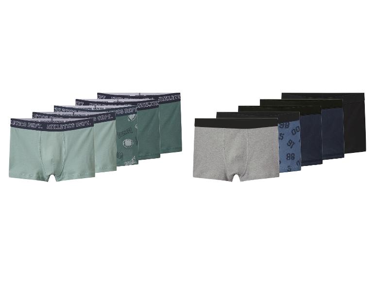 Set herenboxershorts in groene, grijze en blauwe tinten, met diverse patronen.
