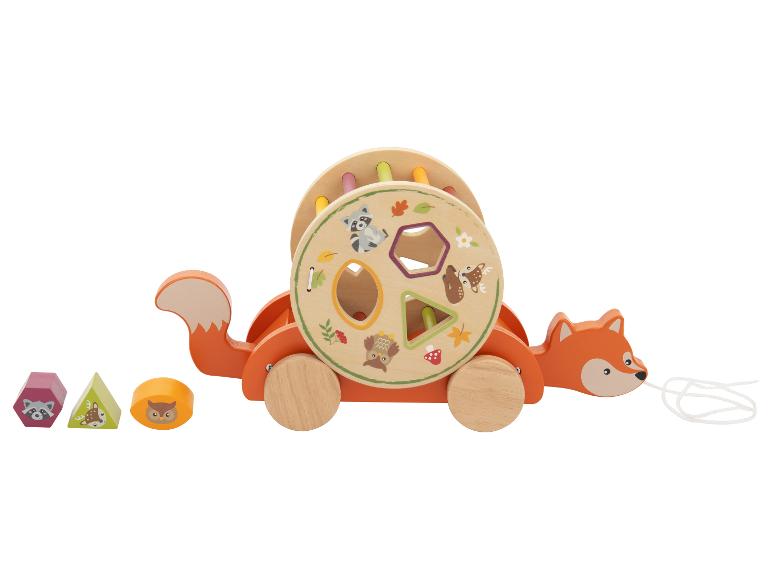 Houten vos trekfiguur met vormensorteerder en drie vormblokken.