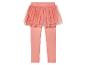 Roze leggings met een glitterende tule rok eroverheen.
