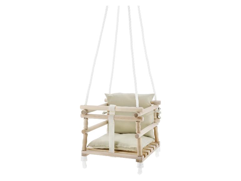Houten babyschommel met beige kussens