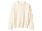 Crèmekleurige trui met ronde hals van pluizige bouclé stof.