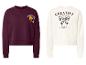 Twee sweatshirts: een bordeauxrode met 'Croissant Club' en een witte met 'Creative Vibes'.