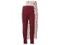 Twee baby leggings: één effen bordeaux en één crèmekleurig met bloemenpatroon.
