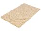 Beige badmat met gebogen patroon