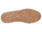 Bruine sportzool met stippenpatroon en antislip elementen.