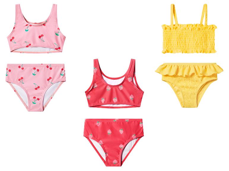 Kinderbikinisets: roze met kersen, rood met aardbeien en geel met ruches.