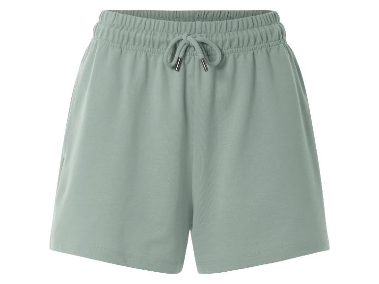Lichte groene jogging shorts, casual stijl.