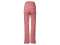 Roze gebreide broek met elastiek in de taille.