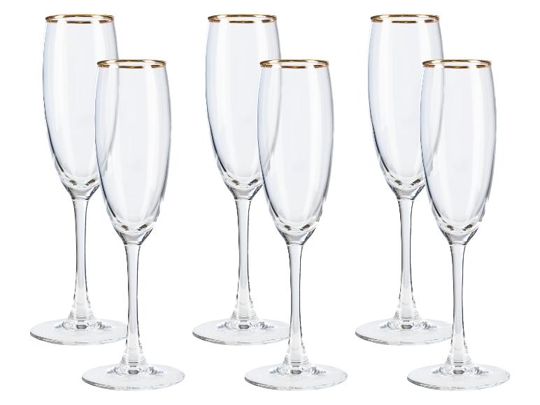 Zes glazen met een gouden rand, geschikt voor champagne of prosecco.