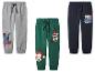 Drie kinder joggingbroeken met Superman, Mickey Mouse, Goofy en Paw Patrol.