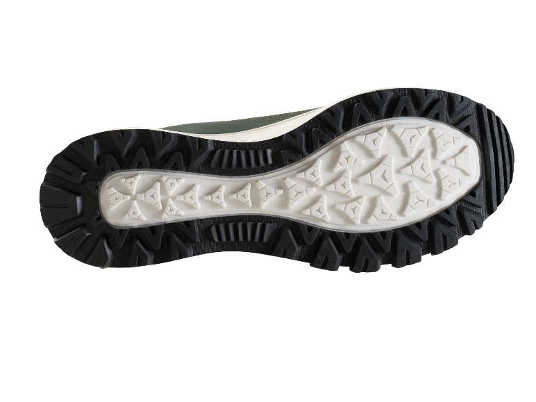 Zool van een olijfgroene sportschoen.