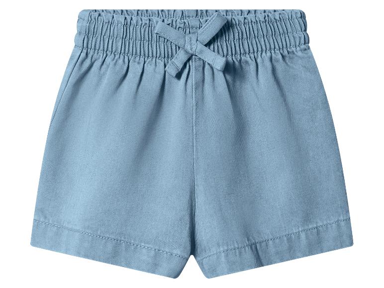 Lichtblauwe dames shorts met elastische tailleband en decoratieve strik.