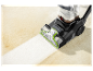 Bissell PowerWash reinigt een tapijt.