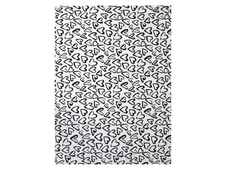 Witte keukendoek met zwart hartjespatroon