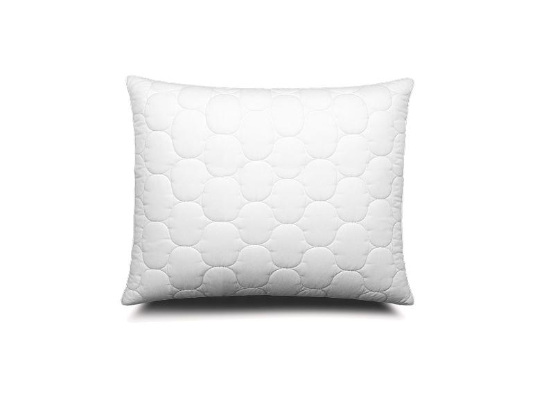Wit gewatteerd kussen met cirkelvormig patroon