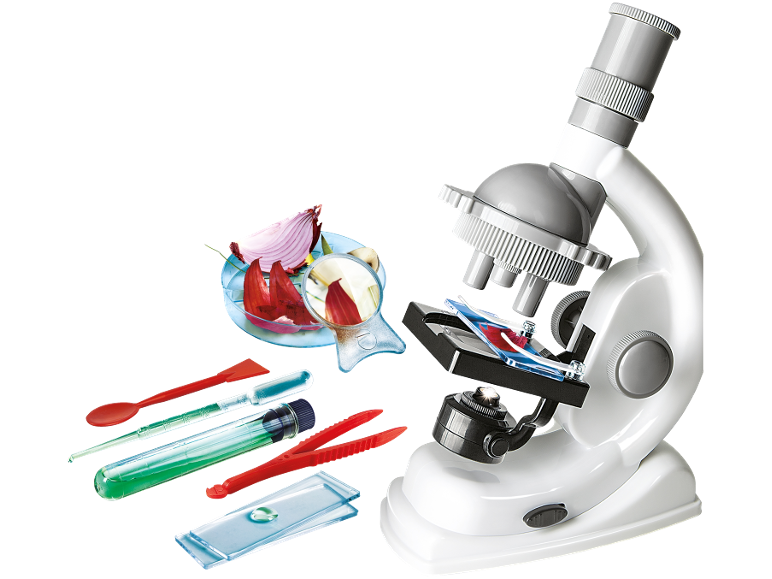 Kindermicroscoop met een set instrumenten en uienmonsters op een zwarte achtergrond.