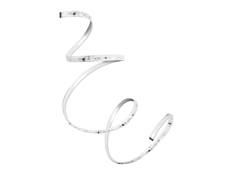 Witte LED-lichtstrip met chips en pijlen die de richting aangeven.